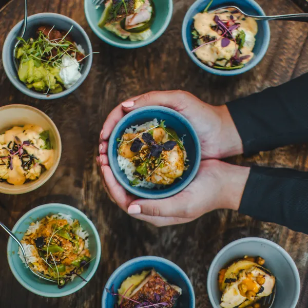 A selection of small food bowls with different fillings